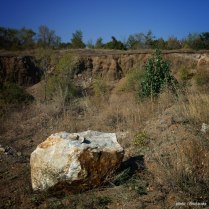 Albitite fragment on the upper part of Dmitrievskii quarry, Oktyabr'skii Massif (Mariupol'skii), Azov Sea Region, Donetsk (Donets'k) Oblast', Ukraine, field photo