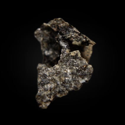 Platy crystals of åkermanite Ca2Mg(Si2O7) with needle-like kalsilite KAlSiO4 in Venanzite (kalsilite-phlogopite-olivine-leucite melilitite); Vispi Quarry, San Venanzo, Terni Province, Umbria, Italy; 24 × 20 × 15 mm